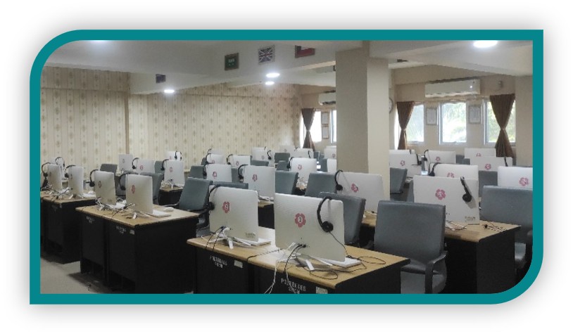 Language laboratory with computers and headsets